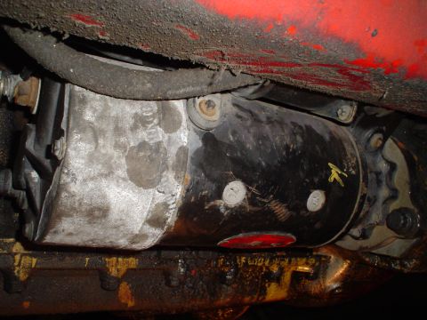 1966 International School Bus - Close-up view of a starter motor and transmission housing, showing mechanical components.