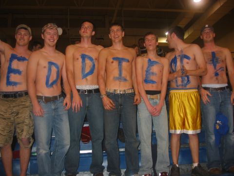 1989 Ford Bronco - A group of young men pose with blue paint on their chests.