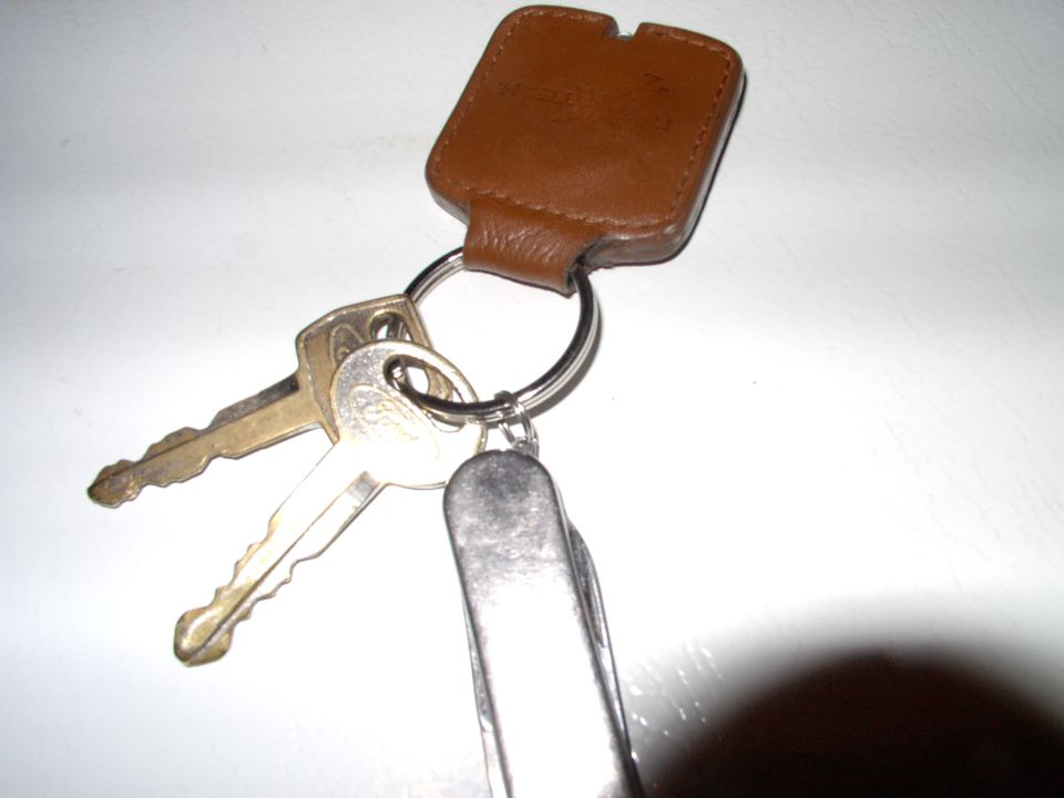 Here's the little LED light inside the leather key fob from Radio Shack. Had it for a year and it's super bright and never turns on and wastes the battery in your pocket.