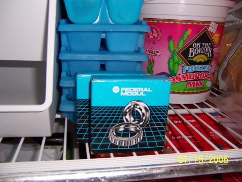 1987 Ford Bronco - Boxed Federal Mogul bearings are stored on a shelf next to frozen drink mix and ice cube trays.
