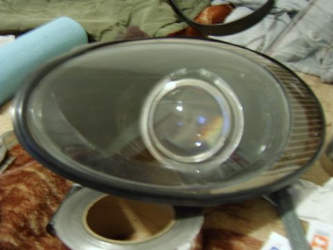 1998 Ford Taurus - A single headlight assembly is shown, not a complete vehicle.