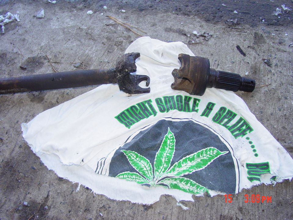 Driveshaft U-joint and yoke on a t-shirt with a marijuana leaf graphic and text