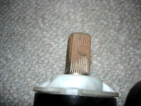 1979 Ford Bronco - A close-up view of a splined shaft, showing some signs of wear and rust.