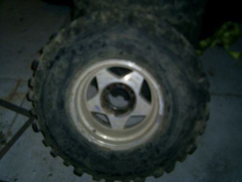 1977 Ford F-150 - A tire and wheel assembly is shown in detail.