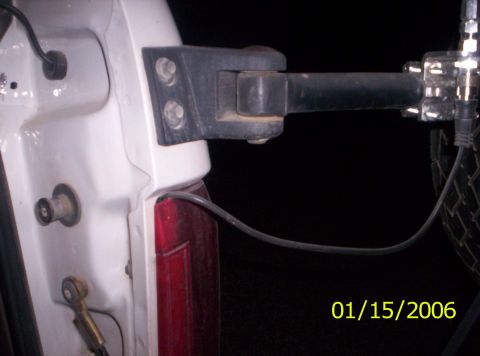 1995 Ford Bronco - Here's a picture showing how I routed my antenna. I just took off the tail light lense and popped it on through.