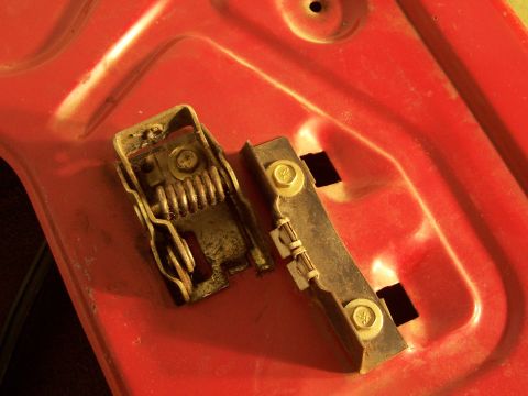 1978 Ford Bronco - Close-up of a door latch mechanism, likely from a vehicle. Supermotors.net logo is present.