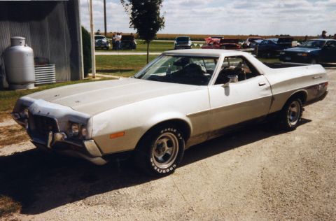 1972 Ford Ranchero - This 1972 Ford Ranchero is seen parked outdoors with other cars visible in the distance.