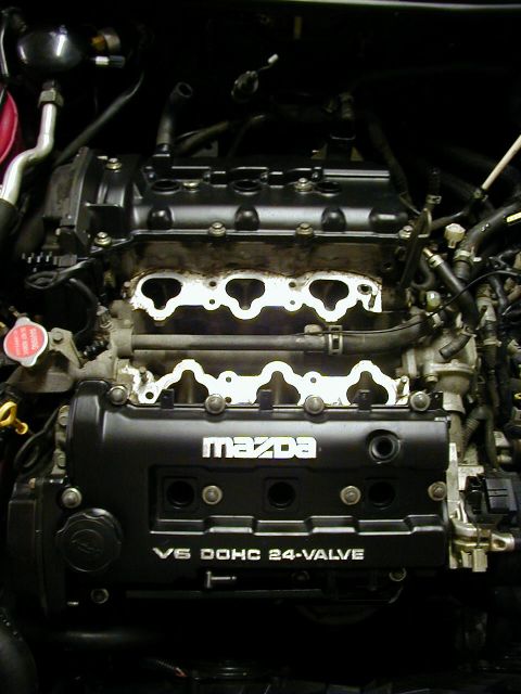 1997 Ford Probe - Engine bay view of a Mazda V6 DOHC 24-Valve engine.
