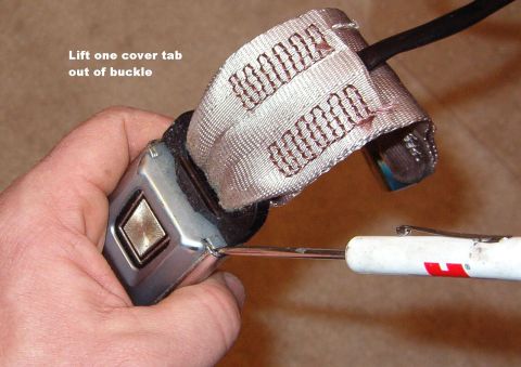 1994 Ford Crown Victoria - Since I also wanted to wash the seat belts, I disassembled the buckle. After working the blade tip into the gap as shown, rotate the screwd…