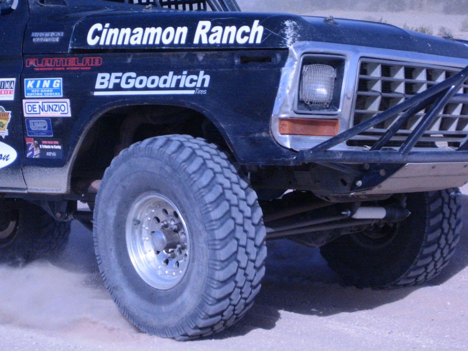 Front fender of black race truck with Cinnamon Ranch and BFGoodrich decals
