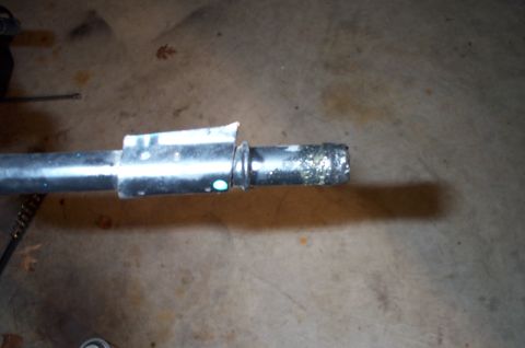 1998 Ford Crown Victoria - The bracket for the NPI coolant tube had to be cut off so it would not interfere with the new coolant tube. This is the old coolant tube, c…