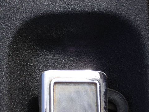 1985 Ford Bronco - Close up by handle to show texture
