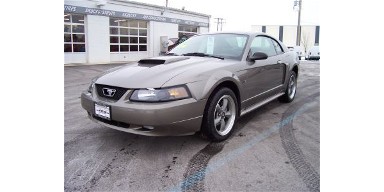 1998 Ford Taurus - This 2001 Ford Mustang GT coupe is shown from the front three-quarter view.