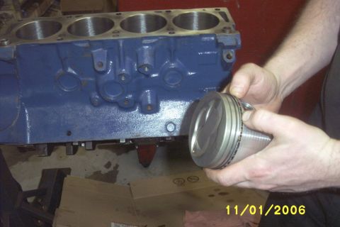 1967 Ford Galaxie - A blue engine block is shown with a piston being held by hands. The date 11/01/2006 is visible.