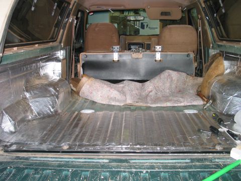 1989 Ford Bronco - Here is the cargo area with both side panels done and half of the floor