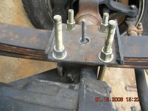 1991 Ford F-150 - The new spring plate...Cut it out from 1/4" plate and then cut two 1 1/2" strips to across the ends to keep it from pulling down. This is t…