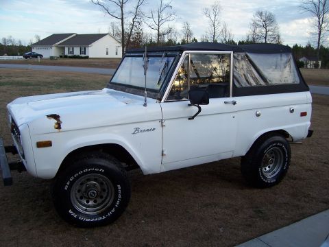 1974 Ford Bronco - This 1974 Ford Bronco is seen from a 3/4 front angle, parked outdoors.