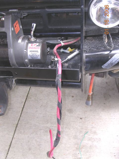 1994 Ford Bronco - Close-up of a vehicle's winch and wiring, with a visible date stamp of January 18, 2006.