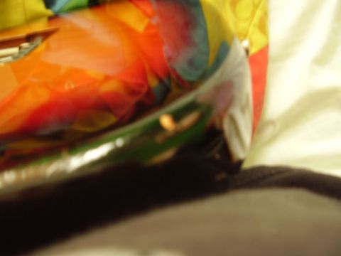 1996 Ford F-150 - A close-up shot shows a piece of colorful fabric with a reflective chrome trim.