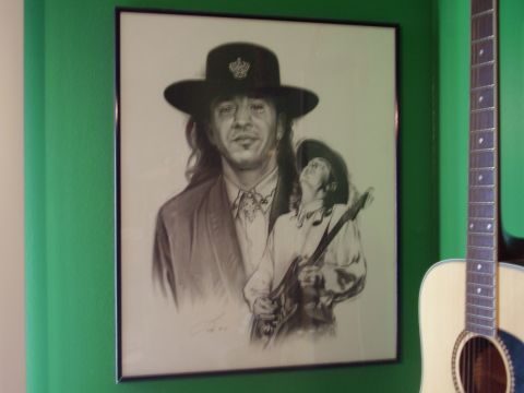 1996 Ford F-150 - Drawing of Stevie Ray Vaughan on a wall next to an acoustic guitar.