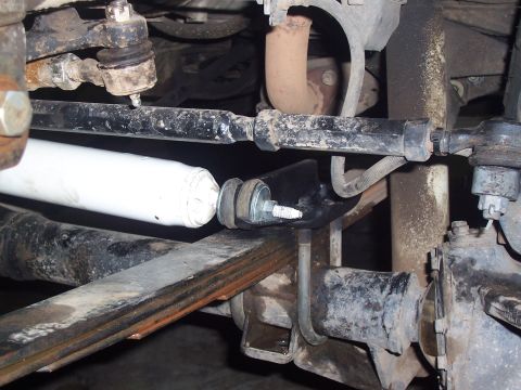 1988 Suzuki Samurai - This image shows the underside of a vehicle, focusing on the suspension and steering mechanisms.