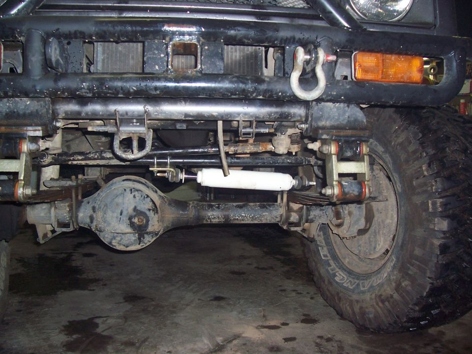 Front axle and suspension with off-road tires and winch hook