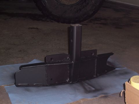 1988 Suzuki Samurai - A custom-fabricated trailer hitch receiver assembly is shown, a square tube receiver and mounting brackets.