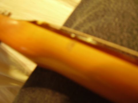 1996 Ford F-150 - Dent on edge of fret-board of the 1st fret.
