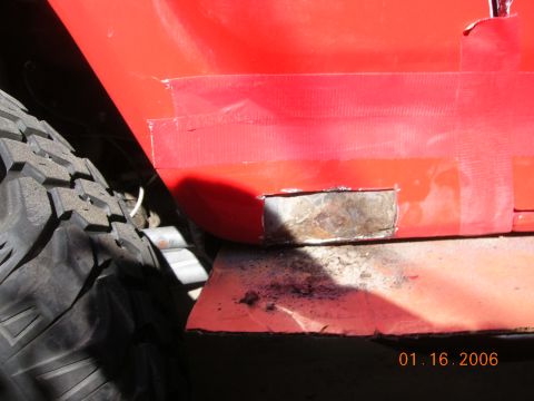 1985 Ford Bronco - cut out rust and wire brushed the metal behind it...they metal primered the opening...(no pic of that)