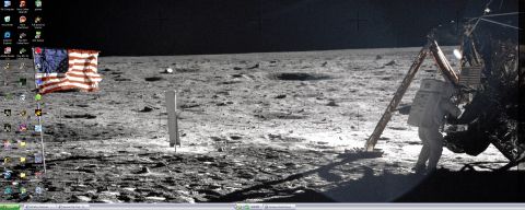 1988 Ford Bronco - This desktop wallpaper depicts the iconic moon landing scene, an astronaut and the American flag planted on the lunar surface.