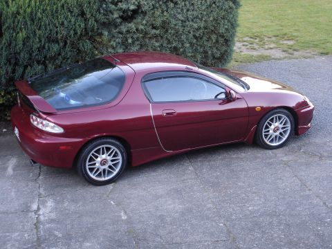1993 Mazda MX-3 - The 1993 Mazda MX-3 coupe is seen here in a 3/4 front profile, its distinctive body style.