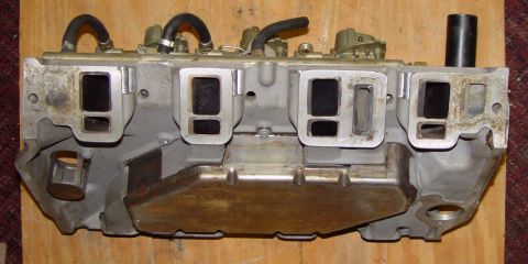 1969 Ford Fairlane - An engine intake manifold is shown, a critical component for internal combustion engines.