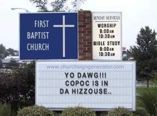 1996 Ford Probe - Church sign displays a humorous message and a SuperMotors advertisement at the bottom.