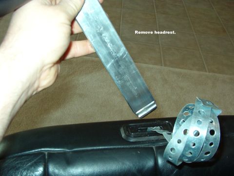 1994 Ford Crown Victoria - Headrest Removed When the tool stops, lower & raise the headrest to allow the tool to go past the spring catch inside, then lift the headre…