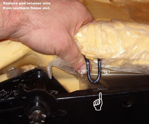 1994 Ford Crown Victoria - Seatback Pad Clips On each side of the pad, a wire loop is clipped into a slot in the frame. Squeeze the loop to extract it. This is one re…
