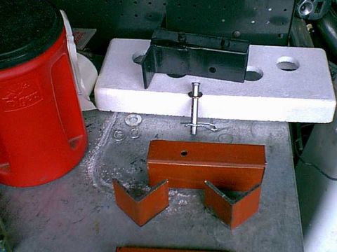1983 Ford Bronco - here is the driver side done and the parts to make the mounts. i used a hitch pin and this allows the flap to be removed for off road playi…
