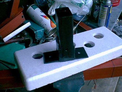 1983 Ford Bronco - here is the bottom view of the mount. the hole is threaded so i can use a bolt to stop the flap from chattering.