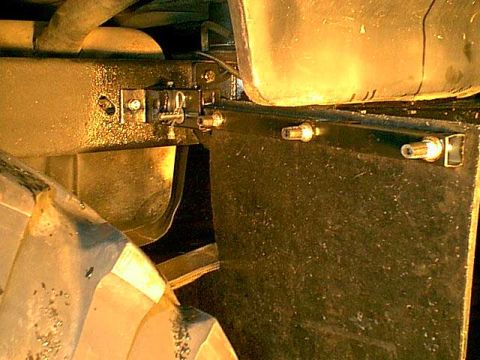 1983 Ford Bronco - you can see the hitch pin here on the front side. i put fue line over the flap bolts to allow easy on and off replacement and no injury fro…