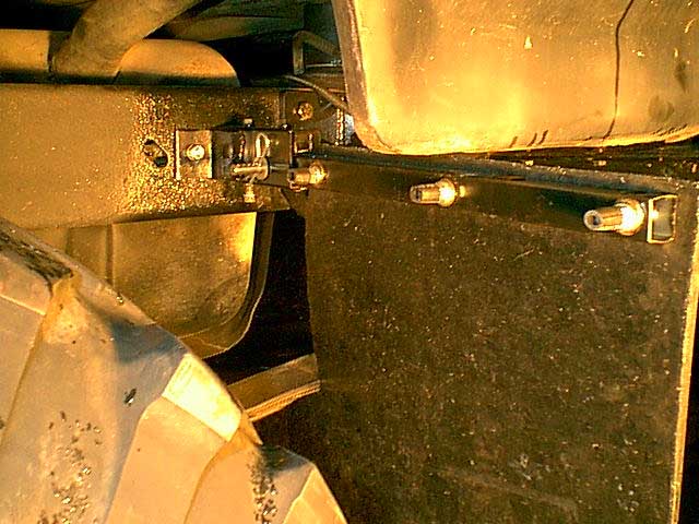 you can see the hitch pin here on the front side. i put fue line over the flap bolts to allow easy on and off replacement and no injury from the bolts.