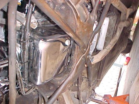 1973 Ford Ranchero - Underside view of engine components including a chrome oil pan and exhaust system.