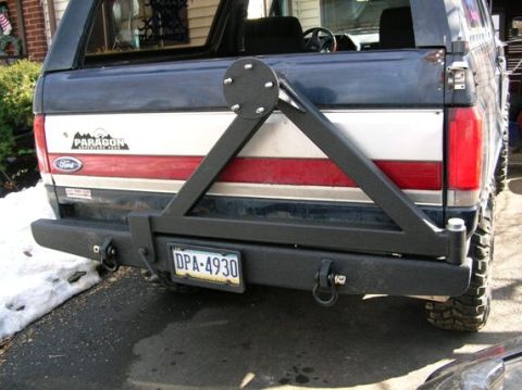1991 Ford Bronco - Rear view of a 1991 Ford Bronco showing its aftermarket bumper and spare tire mount.