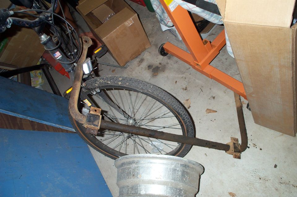 Bicycle wheel and frame with rusty metal parts