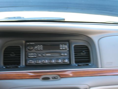 1991 Ford LTD Crown Victoria - Interior view of a car's dashboard, showing the radio and air vents.