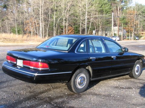 1991 Ford LTD Crown Victoria - This 1991 Ford Crown Victoria LTD is seen from the rear in a parking lot.