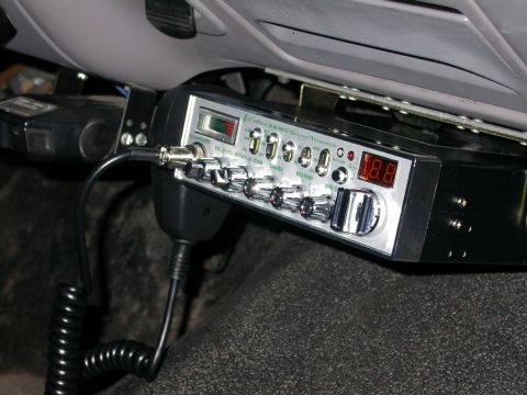 1996 Ford Bronco - A Cobra 29 LTD SoundTracker CB radio is mounted in a vehicle's interior, showing a red digital display.