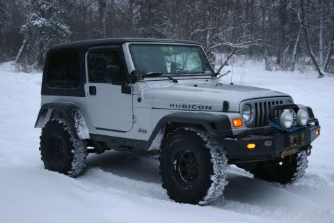 2003 Jeep TJ - Silver 2003 Jeep TJ Rubicon driving in snowy conditions.