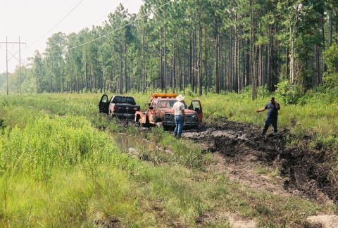 1994 Ford Bronco - right before i snatched the tow truck out. 1 ton ford, worn out 460, 35x15.50 mickey thompsons. he ran out of gas on the way out of the pro…