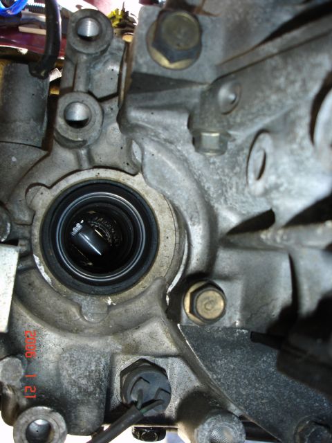 1993 Mazda MX-3 - engine side, rear of gear box looking at point where bell housing and block join in vicinity of sump