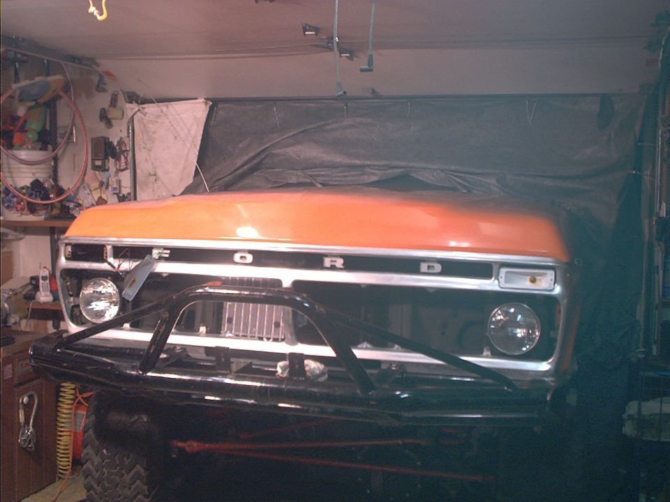 1978 Ford Bronco front end with orange hood and grille
