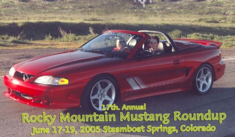 1996 Ford Probe - A red convertible Mustang is shown at the 17th Annual Rocky Mountain Mustang Roundup in 2005.